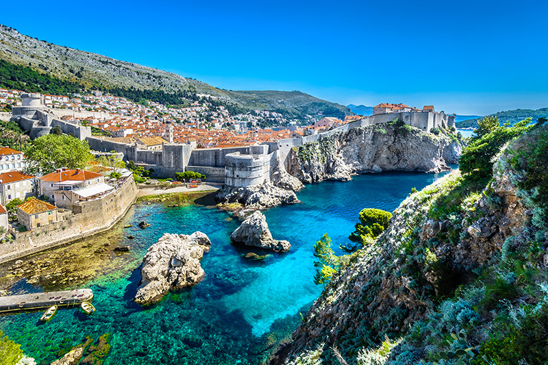 Aerial panoramic view at famous european travel destination, Dubrovnik cityscape on Adriatic Coast, Croatia.
